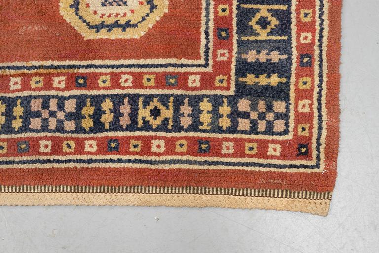 Märta Måås-Fjetterström, a carpet, "Röd Flossa", knotted pile, ca 300 x 272 cm, signed AB MMF.