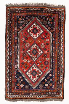 An old Shiraz rug, c. 240 x 155 cm.