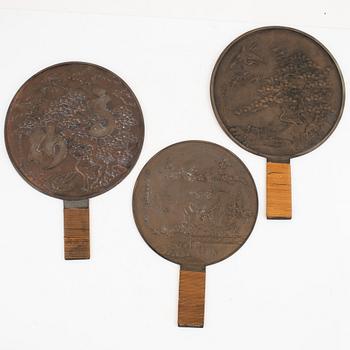 Three Japanese mirrors, first half of the 20th century.