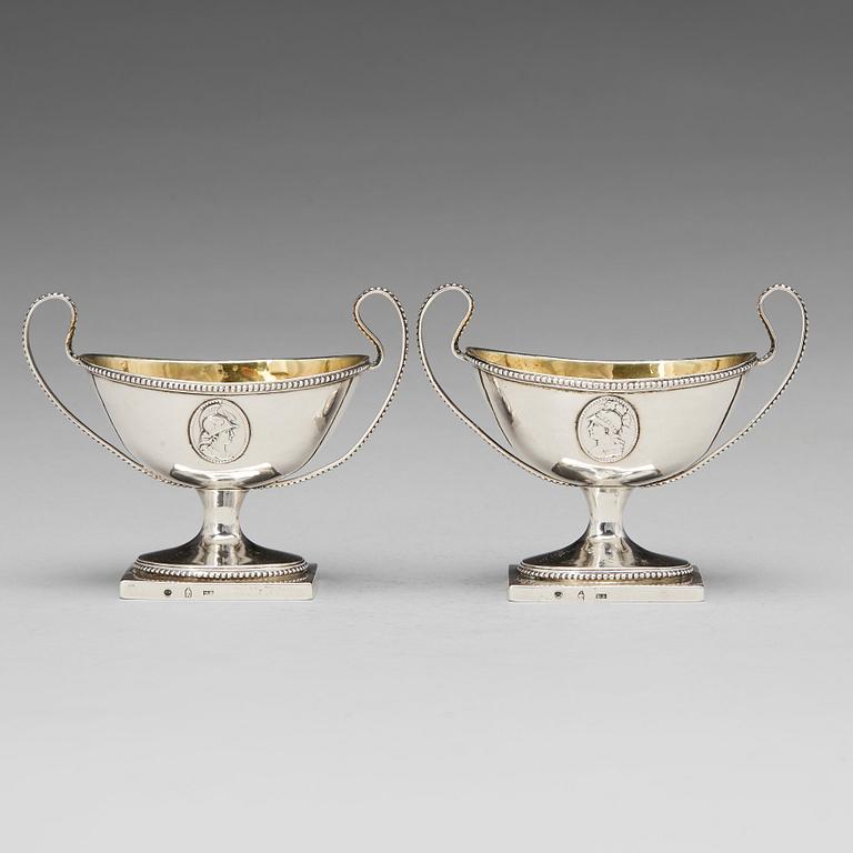A pair of Swedish late Gustavian parcel-gilt silver salt-cellars, mark of JJ Ulfsberg, Nykoping (1793-1824(-25)).