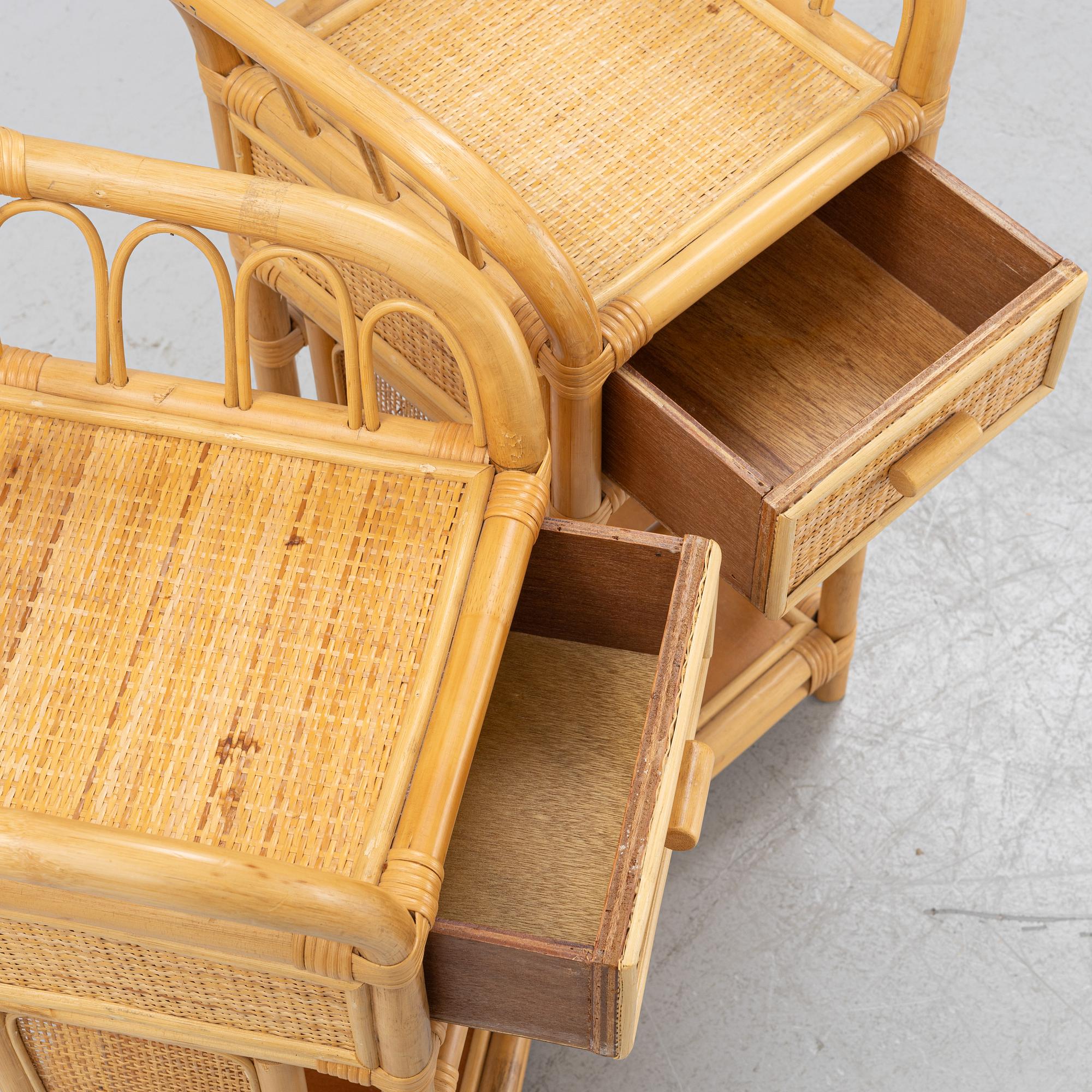 A pair of wicker bedside tables, late 20th century.