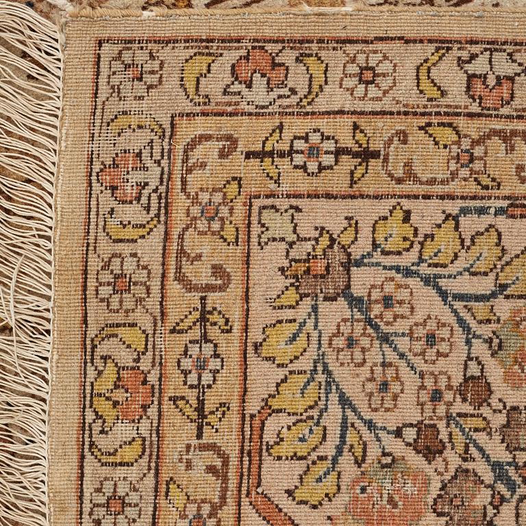 A CARPET, a semi-antique Tabriz, ca 593,5 x 398,5 cm, signed Nämatzade.