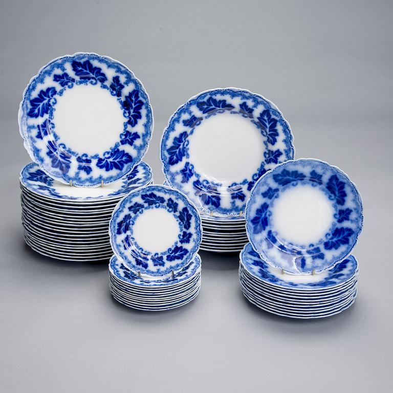 MATSERVIS, 76 delar, flintgods, "Normandy" Flow Blue, Johnson Brothers, England tidigt 1900-tal.