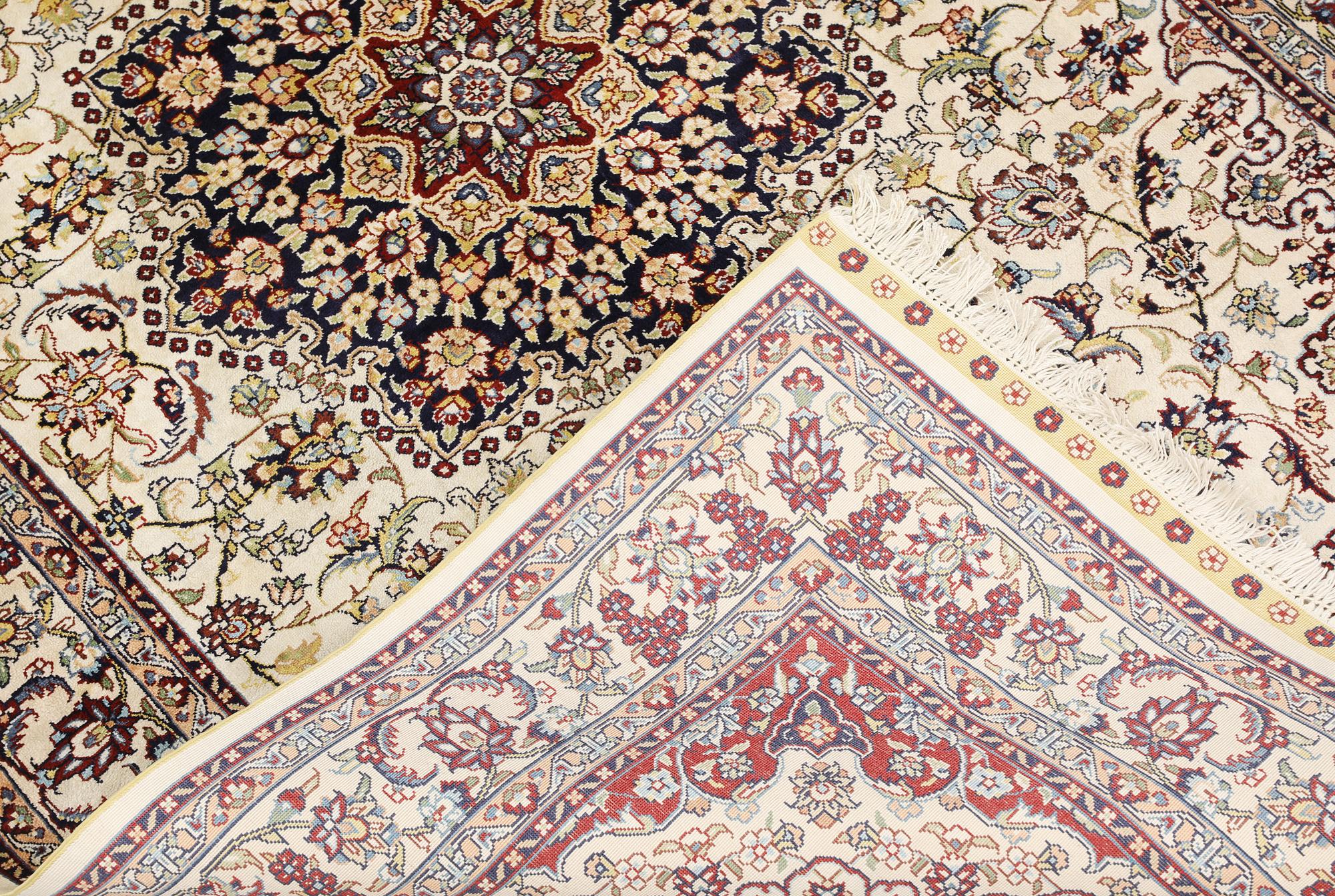 An Oriental silk rug, approx. 153 x 94 cm.