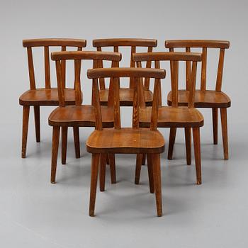 Axel Einar Hjorth, a set of six stained pine "Utö" chairs, Nordiska Kompaniet, Sweden.