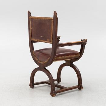 A carved Renaissace style armchair, late 19th Century.