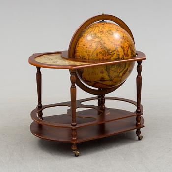 A globe shaped drinks cabinet, circa 2000.