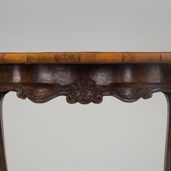 A mid 18th century rococo table.