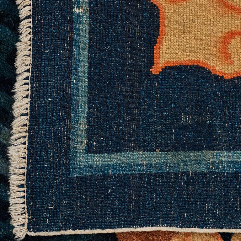 A carpet, a semi-antique Chinese,  ca 255 x 199-202,5 cm.