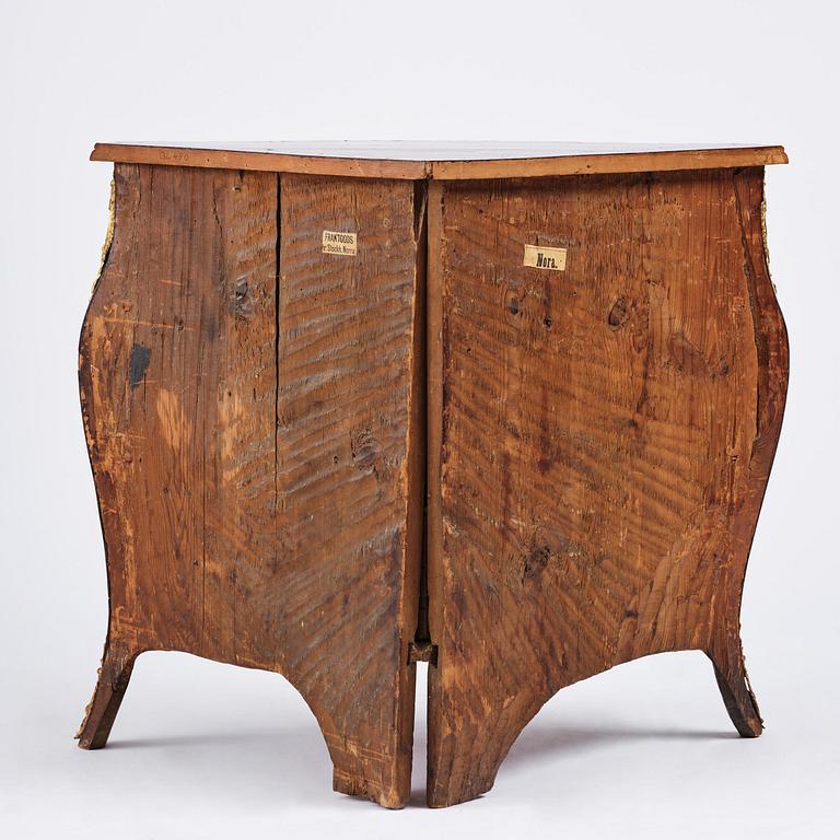 A Swedish parquetry rococo corner-commode, Stockholm later part 18th century.