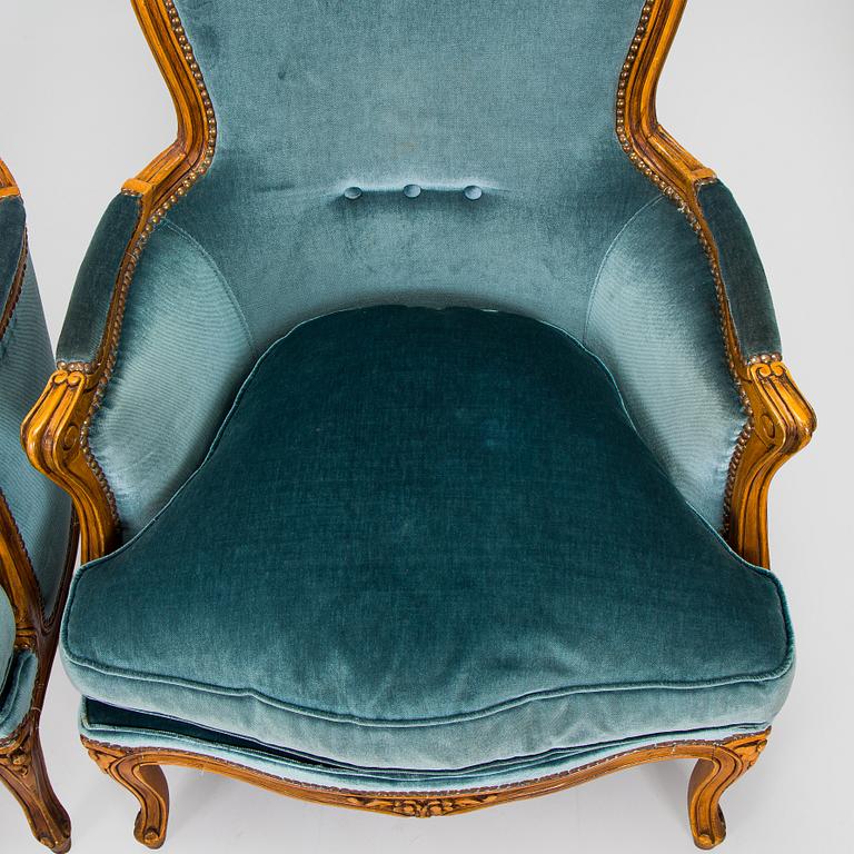A pair of Louis XV style armchairs, mid-20th century.