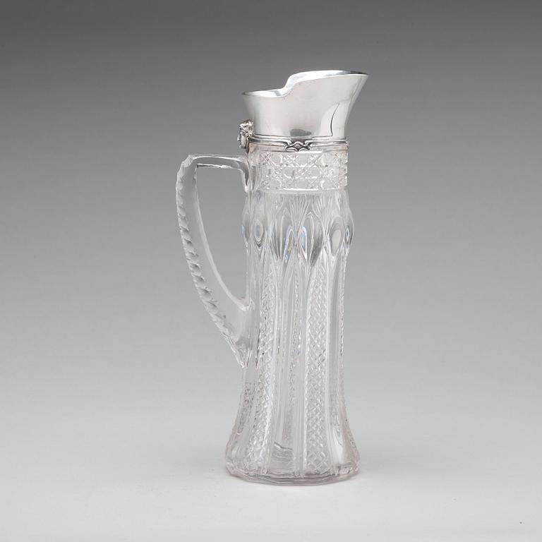 A Tiffany & Co silver and cut glass decanter, circa 1900.