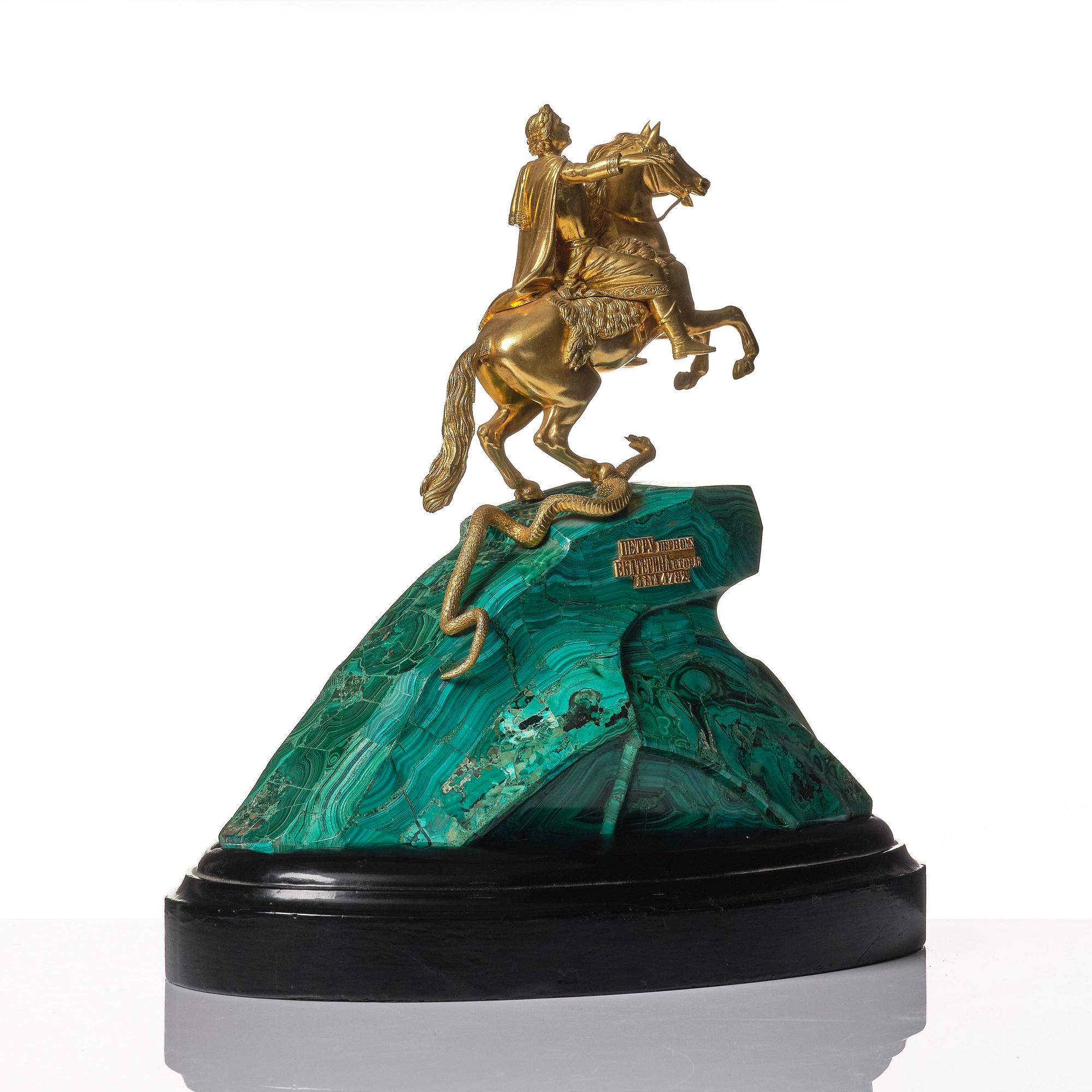 A malachite and gilt bronze sculpture of Peter the Great on horseback after Falconet, 19th century.