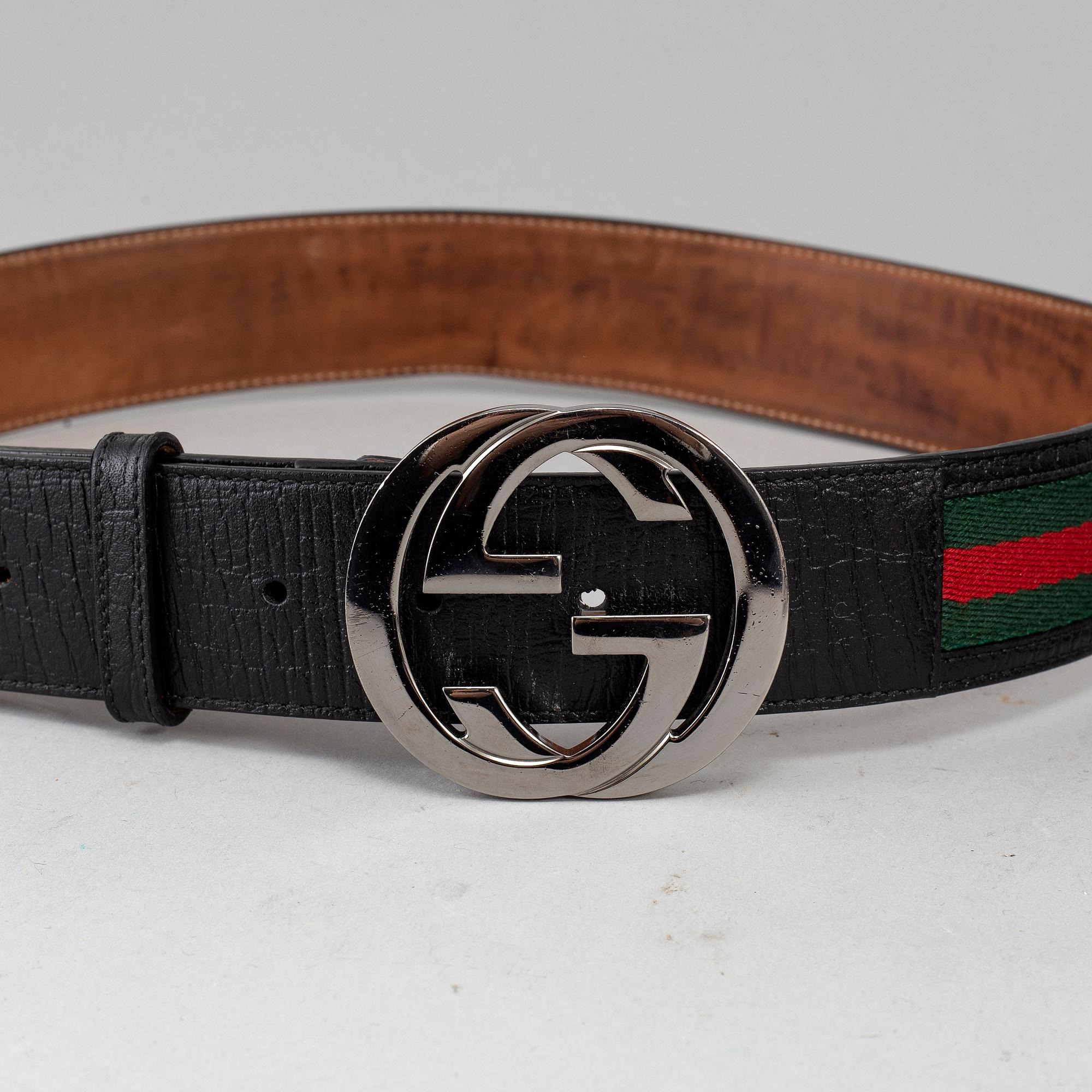 GUCCI, a belt + a calendar case.