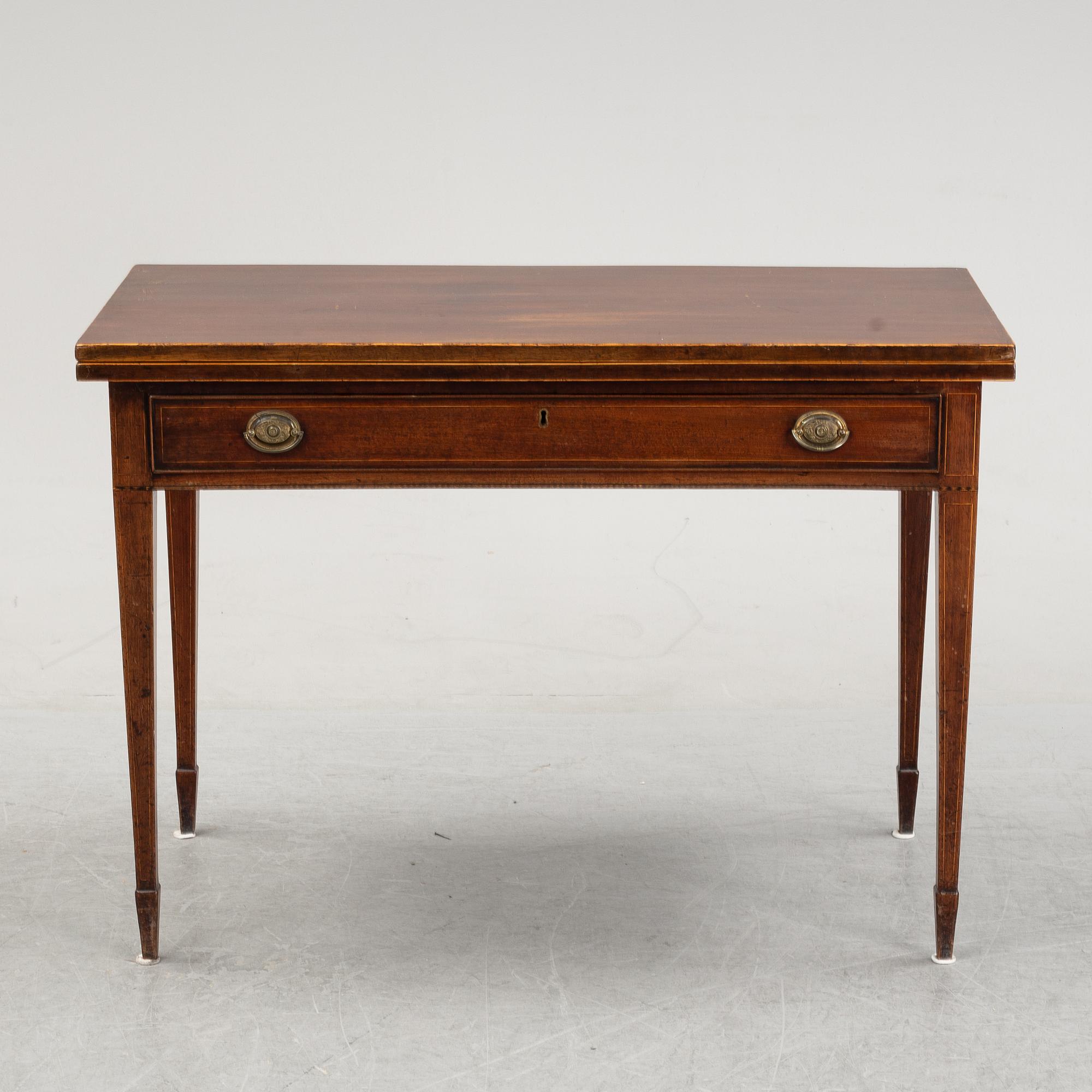 A mid 19th Century mahogany card table.