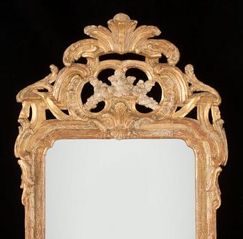 A Swedish Rococo 18th century mirror by J Åkerblad, master 1758.