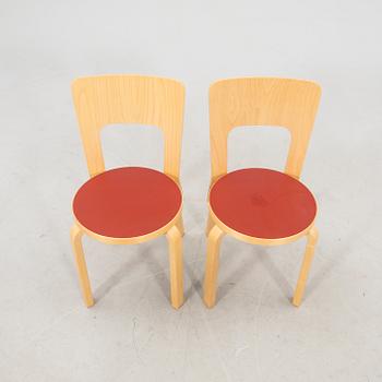 Alvar Aalto, a pair of model 66 chairs, Artek 2008.
