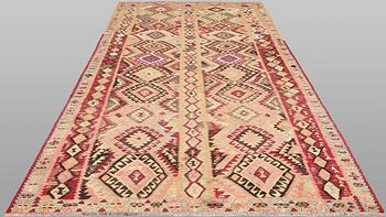 A Nomad Kilim rug, approx. 387 x 185 cm.
