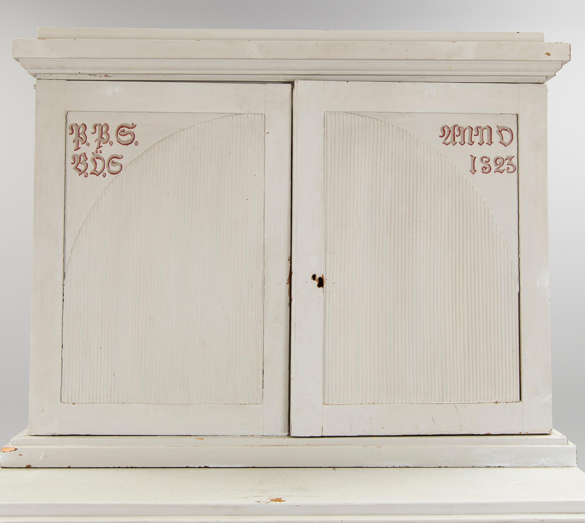 A early 19th century Gustavian cupboard.