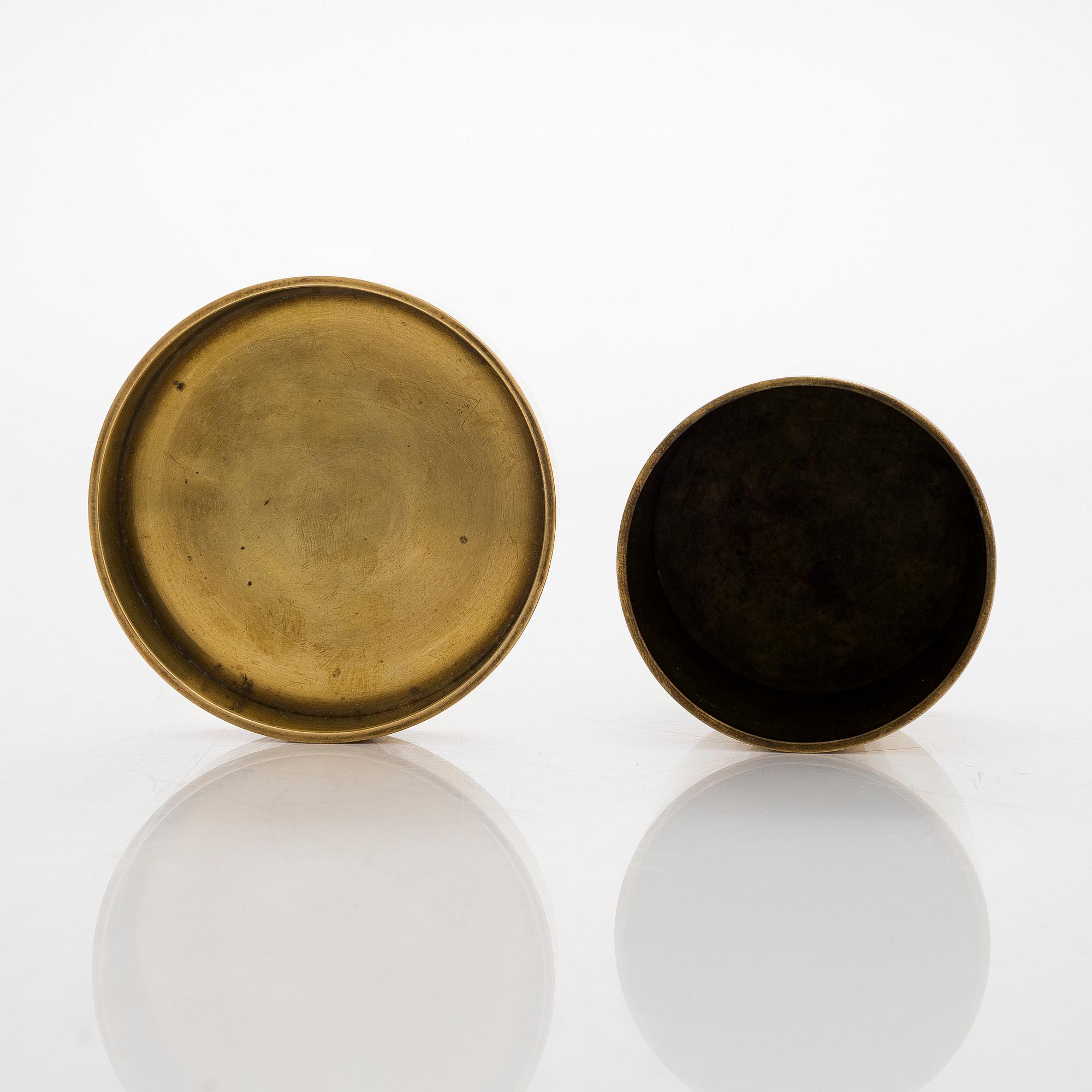 Maija Heikinheimo, a set of two mid-20th century brass jars, manufacturer Valaistustyö for Artek.