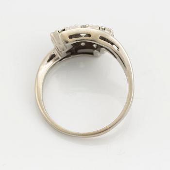 A 14K gold ring set with diamonds.