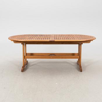 A 9 pcs stained teak garden suite by Brafab around 2000.