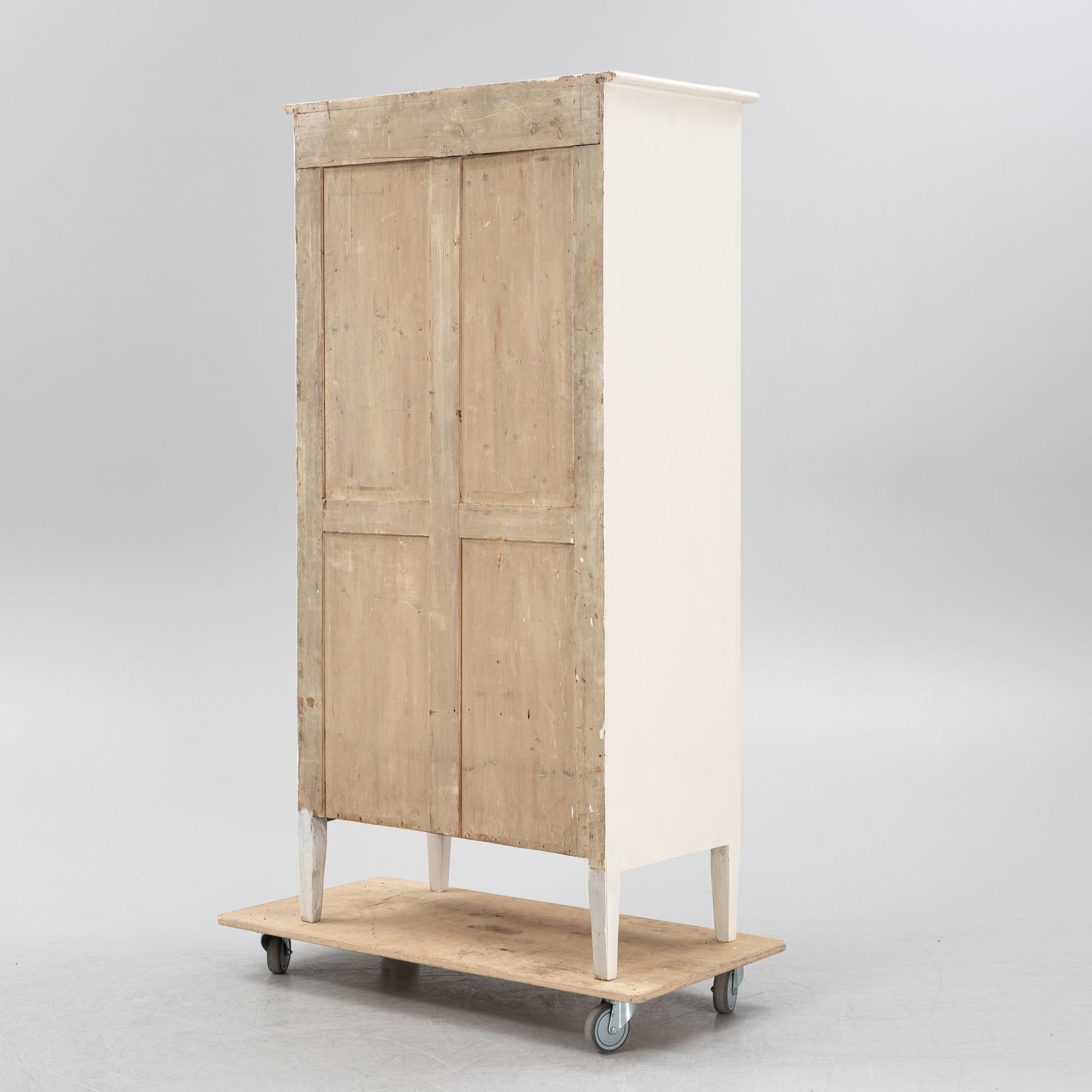 A Gustavian style cabinet, early 20th Century.