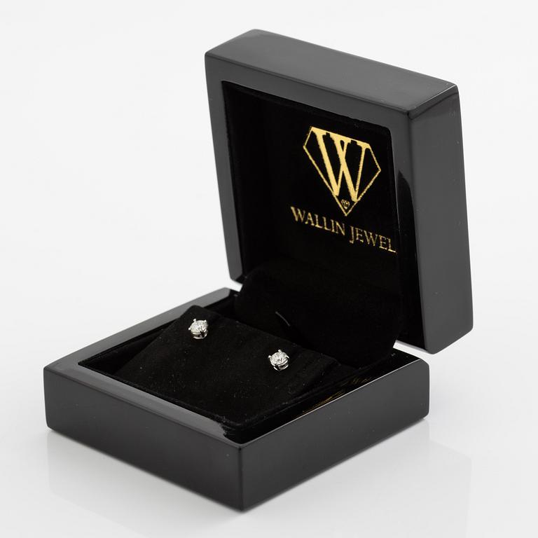 Earrings, a pair, 18K white gold with brilliant-cut diamonds totalling 0.60 ct.