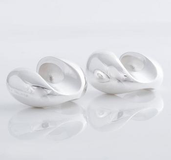 A pair of cufflink, by Ole Lynggaard.