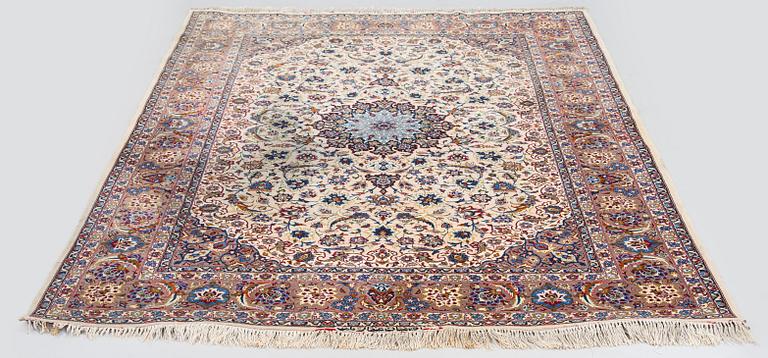 A semi-antique Isfahan rug, central Persia, signed c. 238 x 165 cm.