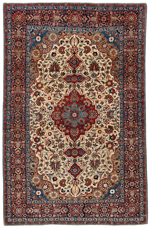 A rug, semi-antique, Teheran, part silk, 204 x 132 cm.