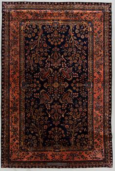 A semi-antique Manchester Kashan, 275 x 183 cm.