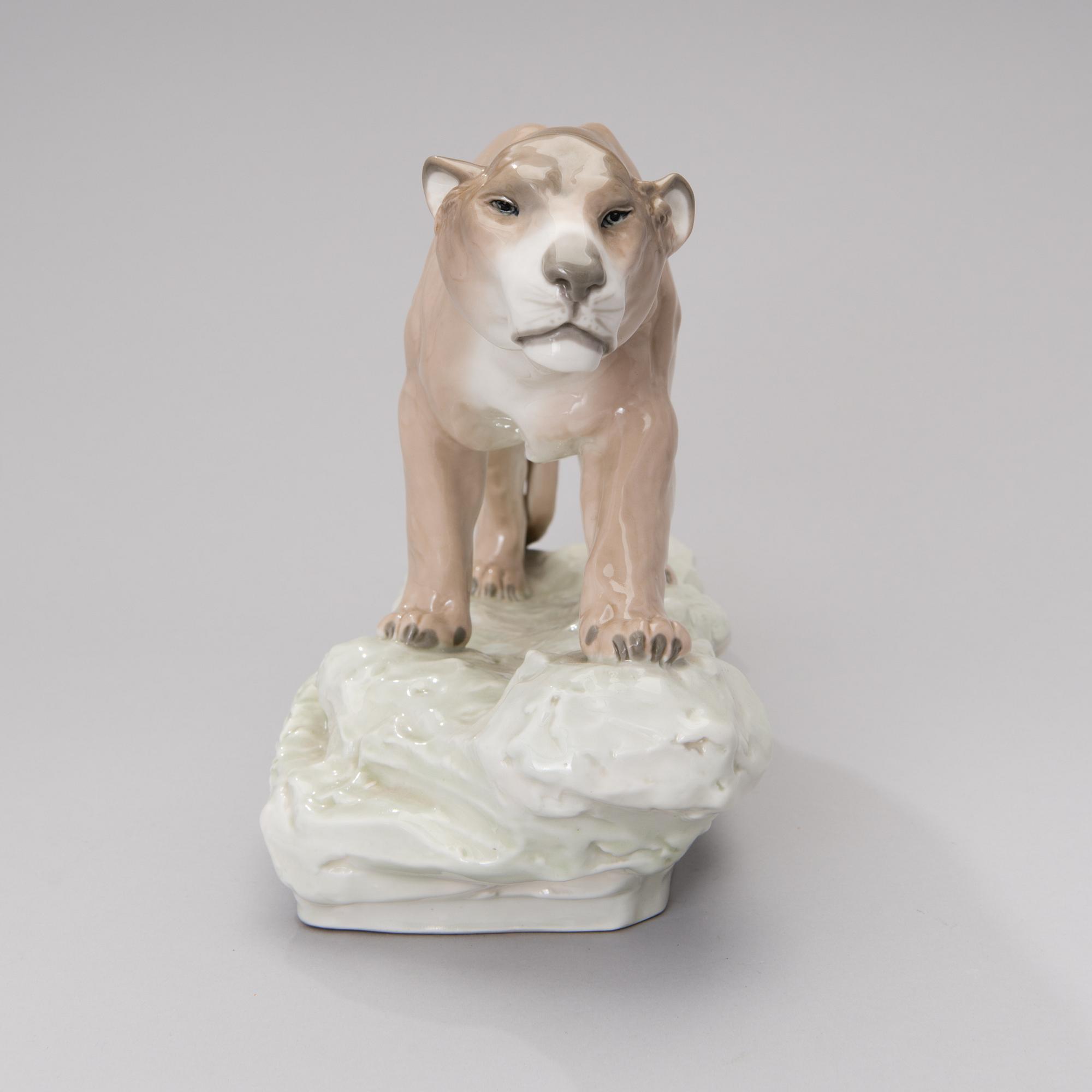 An Amphora porcelain figurine 2882, impressed mark Strasser Wien.