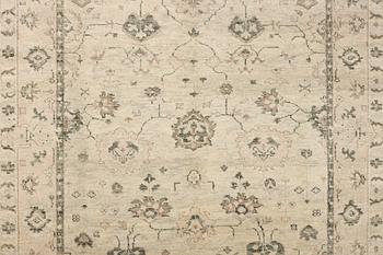 An oriental carpet with Mamluk-design, c. 360 x 280 cm.
