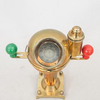 An 19th/20th century brass binnacle.