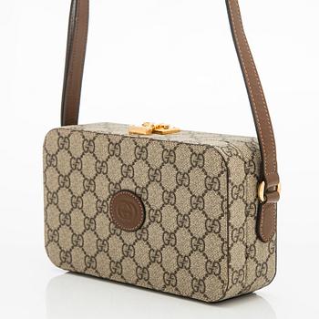 Gucci, "GG Supreme" laukku.