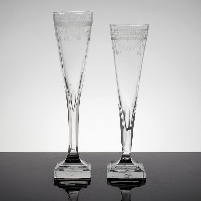 A set of 8 early 19th century champagne glasses.