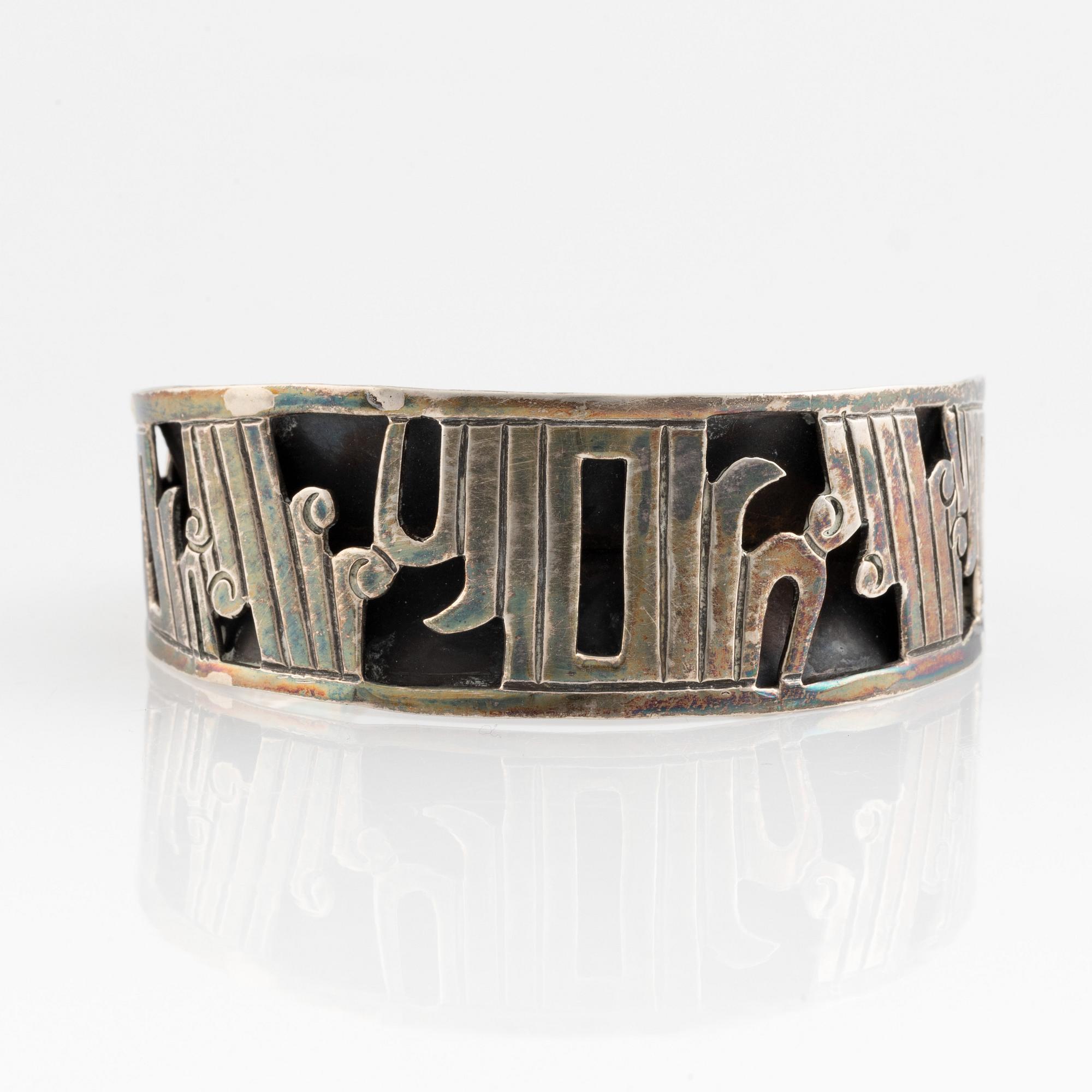 Silver bangle, Mexico.