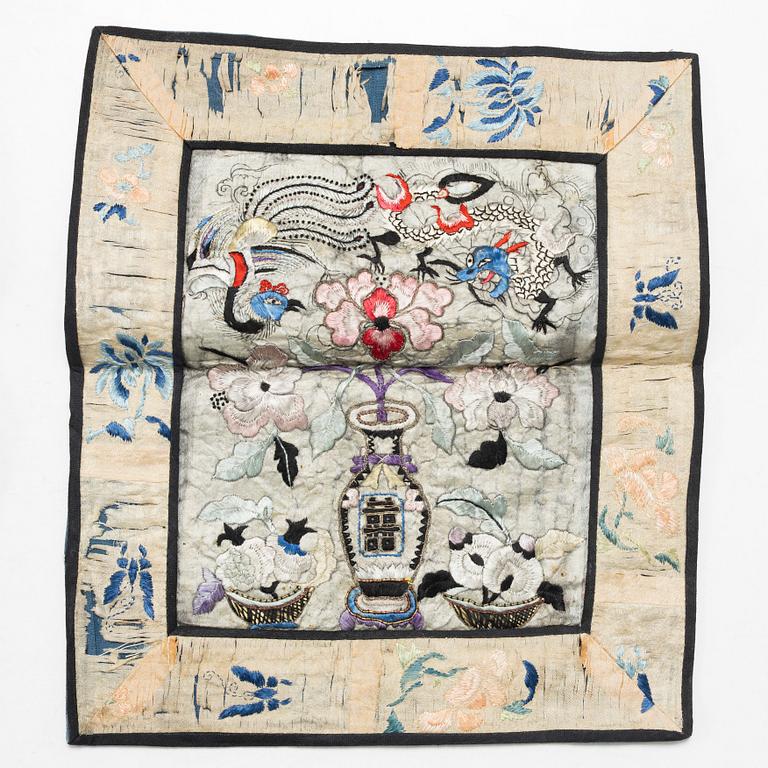 Three Chinese lacquer and wooden panels, two silk embroideries, first half of the 20th century.