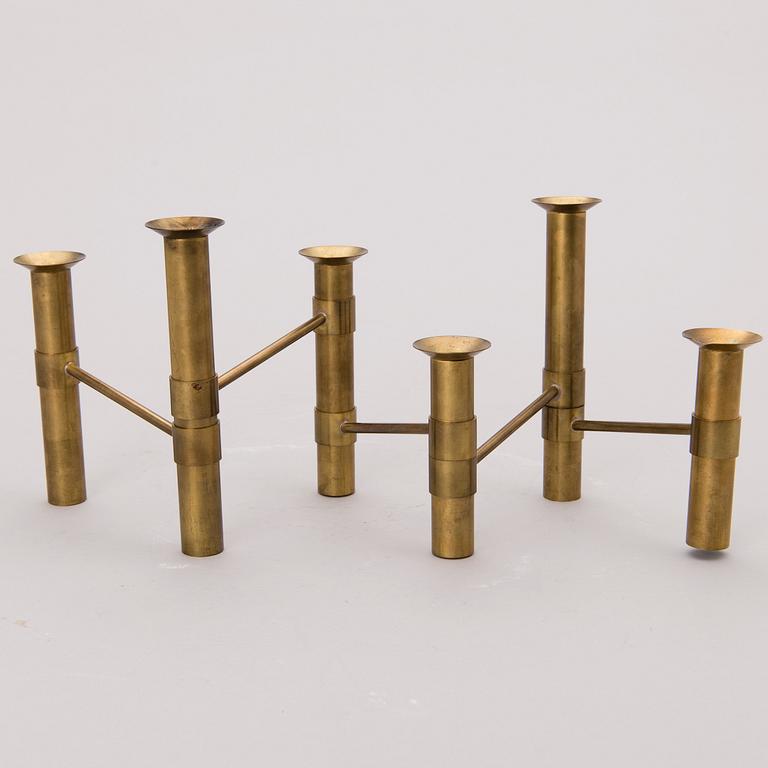 A 1970s 'Nonstop' brass serial candelabra by Hopeakeskus, Finland.