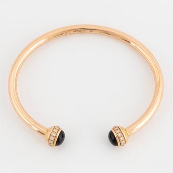 Piaget 18K rose gold, brilliant-cut diamonds and onyx cabochons.