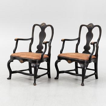 A pair of Rococo style armchairs. first half of the 20th Century.
