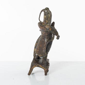 A Chinese bronze figure of a guardsman, Ming dynasty (1368-1644).