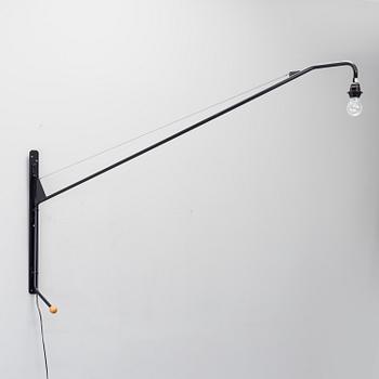 a JEAN PROUVÉ "Potence" wall light designed in 1950, ansorg for Vitra.