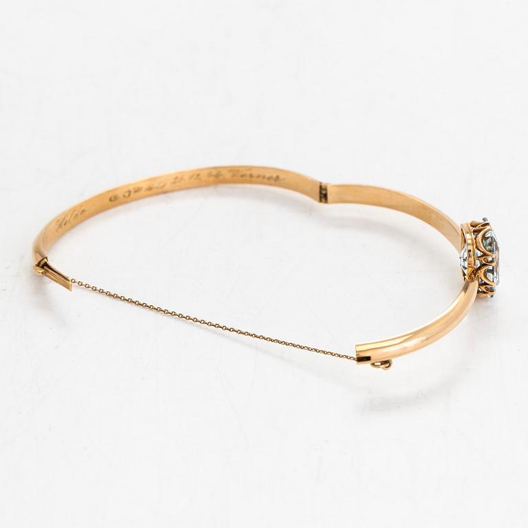Armring, 18K guld, och akvamarin, Gösta Helenius, Åbo.