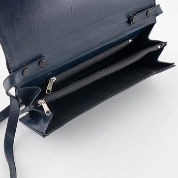 Gucci, a handbag.
