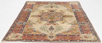 A semi-antique Tabriz carpet, West Persian, c. 250 x 175 cm.