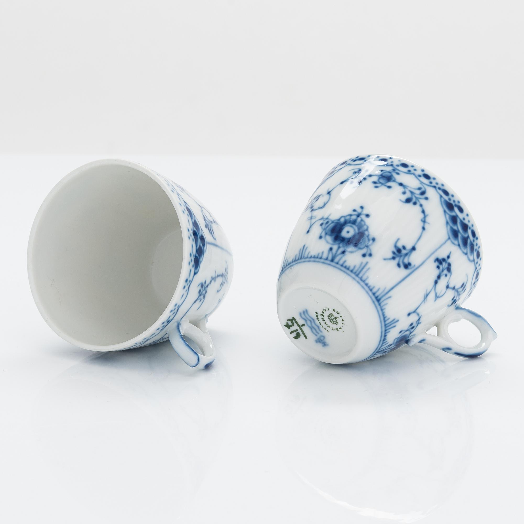 A 31-piece Royal Copenhagen 'Musselmalet' porcelain coffee set.