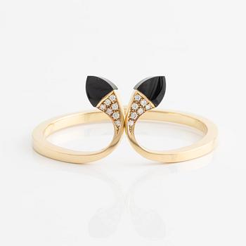 Bangle with onyx and brilliant-cut diamonds.