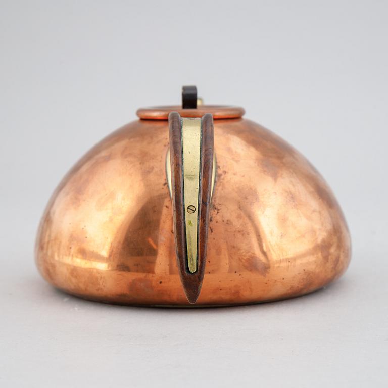 A copper, brass and rosewood teapot, Illums Bolighus, Denmark, 1950's.